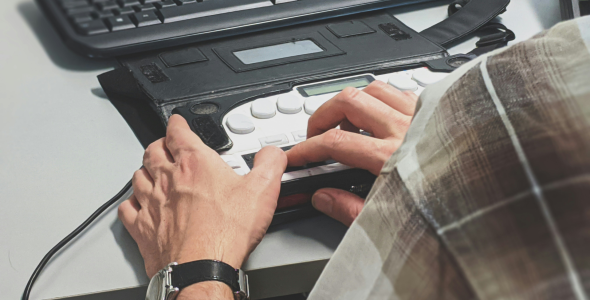 person using assistive technology to navigate a website