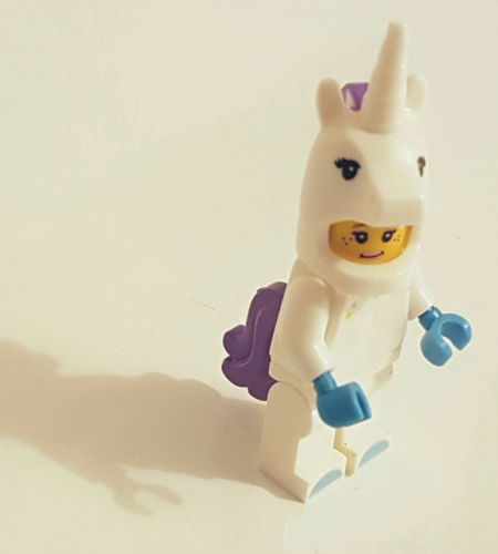 Lego figure in a unicorn costume