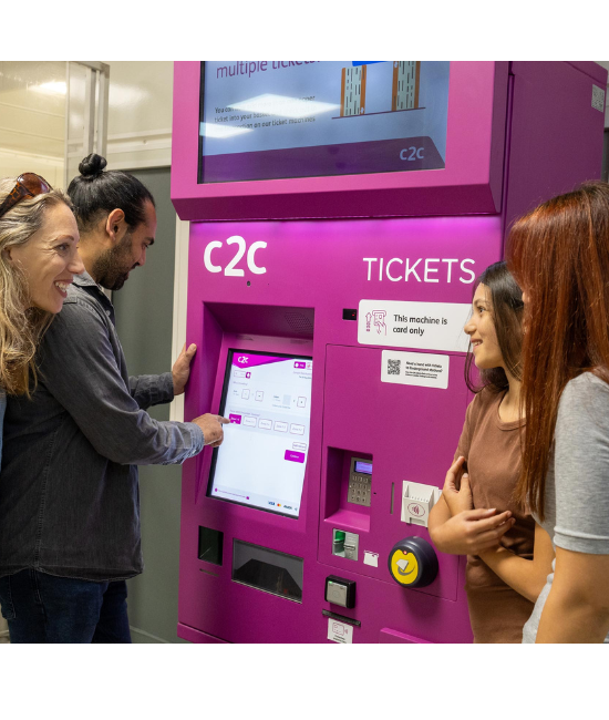 People using a c2c ticket vending machine