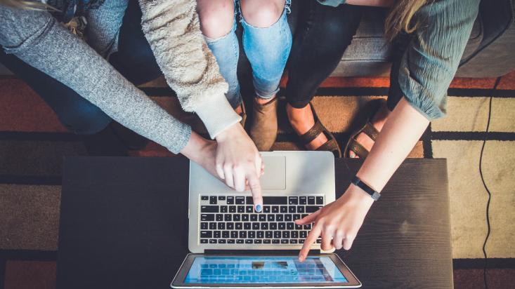 Customer loyalty, group of people on laptop